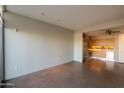 Open living area with concrete floors and city views at 4745 N Scottsdale Rd # 3013, Scottsdale, AZ 85251