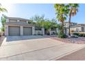 Two-story home with two-car garage and desert landscaping at 16677 E Westby Dr # 201, Fountain Hills, AZ 85268