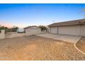 Spacious garage with attached workshop and ample storage space at 2221 E Joy Ranch Rd, Phoenix, AZ 85086