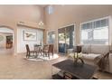 Casual dining area with adjacent sitting area and access to backyard at 12006 W Vernon Ave, Avondale, AZ 85392