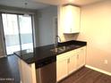 Kitchen with stainless steel dishwasher and granite countertops at 3330 S Gilbert Rd # 1088, Chandler, AZ 85286