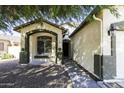 Front entrance with walkway and covered porch at 45142 W Windrose Dr, Maricopa, AZ 85139