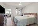 Spacious main bedroom with king-size bed and access to living area at 7009 E Acoma Dr # 1105, Scottsdale, AZ 85254