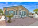 Charming single-story home with a carport and a small, well-maintained front yard at 8500 E Southern Ave # 368, Mesa, AZ 85209