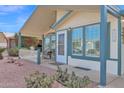 House exterior showcasing a covered patio and a nicely landscaped front at 8500 E Southern Ave # 368, Mesa, AZ 85209