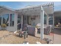 Covered patio with seating area, perfect for outdoor relaxation at 215 N Power Rd # 404, Mesa, AZ 85205