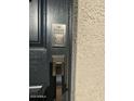 Modern front door with keyless entry and bronze handle at 3290 W San Cristobal Rd, San Tan Valley, AZ 85144