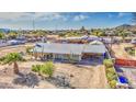 Aerial view showing home, barn and expansive acreage at 18648 N 27Th St, Phoenix, AZ 85050