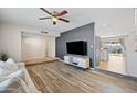 Open floor plan living room with view into kitchen at 2161 E Gemini Dr, Tempe, AZ 85283