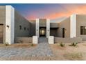 Modern front entry with a custom door and walkway, creating an inviting entrance at 256 E Tumbleweed Dr, Phoenix, AZ 85085