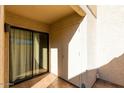 Private patio with sliding glass door access from condo at 1401 E Puget Ave # 24, Phoenix, AZ 85020