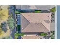 Top-down view of a house with a tile roof and a backyard patio at 814 E Fruit Stand Way, Queen Creek, AZ 85140