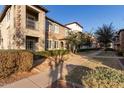 Two story townhome with Spanish style architecture and landscaping at 3615 E Horace Dr, Gilbert, AZ 85296