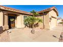 Front entry with walkway, landscaping, and a decorative door at 1450 E Buena Vista Dr, Chandler, AZ 85249