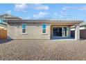 Covered patio overlooking a gravel backyard at 30855 N 138Th Ave, Peoria, AZ 85383