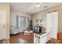 Cozy living room featuring a comfortable chair and a round coffee table at 358 E Goldmine Ct, San Tan Valley, AZ 85140