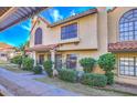 Two-story home with Spanish-style architecture and landscaping at 5704 E Aire Libre Ave # 1072, Scottsdale, AZ 85254