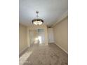 Well-lit bedroom with mirrored closet doors and carpet at 7550 N 12Th St # 143, Phoenix, AZ 85020