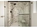 Walk-in shower with marble-style tile and glass door at 4442 E Walatowa St, Phoenix, AZ 85044