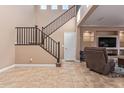 Elegant staircase leading to the second floor at 1864 W Buckhorn Trl, Phoenix, AZ 85085