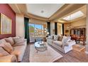 Open concept living and dining area with large windows and natural light at 24686 N 120Th Pl, Scottsdale, AZ 85255