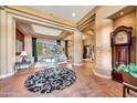 Bright and spacious living room with high ceilings and large windows at 24686 N 120Th Pl, Scottsdale, AZ 85255