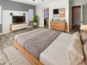 Large main bedroom with en-suite bathroom and ample closet space at 14139 W Gray Fox Trl, Surprise, AZ 85387
