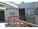 Condominium building exterior with balcony and door at 3434 W Danbury Dr # A204, Phoenix, AZ 85053