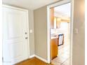 Front door entry with view into kitchen at 1311 E 2Nd Pl, Mesa, AZ 85203