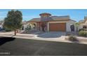 Beautiful home with a two-car garage and nicely landscaped yard at 831 W Sycamore Ct, Litchfield Park, AZ 85340