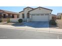 One-story home with two-car garage and desert landscaping at 17915 W Silver Fox Way, Goodyear, AZ 85338