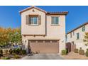 Two-story house with attached garage and landscaping at 3702 E Dogwood Dr, Chandler, AZ 85286