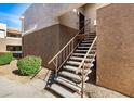 Exterior view showing stairs and building facade at 4554 E Paradise Village N Pkwy # 231, Phoenix, AZ 85032