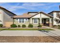 Green house exterior with landscaping and walkway at 4141 E Pony Ln, Gilbert, AZ 85295