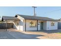 Well-maintained single-story home with a covered carport at 2208 N 35Th St, Phoenix, AZ 85008