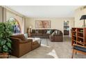 Spacious living room with tile floors and a large window at 954 E Westchester Dr, Tempe, AZ 85283