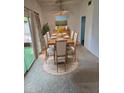 Formal dining room with a large table and chairs, perfect for entertaining at 10617 W Welk Dr, Sun City, AZ 85373