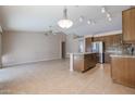Kitchen with stainless steel appliances and an island at 7275 W Tina Ln, Glendale, AZ 85310