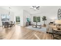 Bright living room featuring hardwood floors and modern furniture at 8218 W Stella Ave, Glendale, AZ 85303