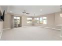 Bright and airy living room with access to a balcony at 17850 N 68Th St # 3025, Phoenix, AZ 85054