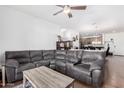 Spacious living room with large sectional sofa and wood-look floors at 2511 W Queen Creek Rd # 340, Chandler, AZ 85248