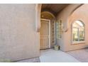 Front entrance with security door and glass block windows at 4202 E Broadway Rd # 132, Mesa, AZ 85206