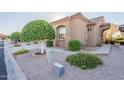 Side view of house showcasing landscaping and a tree at 4202 E Broadway Rd # 132, Mesa, AZ 85206
