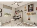 Bright home office featuring a desk, window, and decor at 20250 E Roadrunner Ct, Queen Creek, AZ 85142