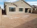 Large backyard with block wall and unlandscaped area at 21039 E Poco Calle St, Queen Creek, AZ 85142