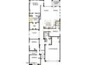 Four-bedroom, three-bathroom home with an open floor plan and covered patio at 32962 N 131St Dr, Peoria, AZ 85383