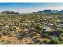 Aerial view of homes and desert landscape at 5917 E Beryl Ave, Paradise Valley, AZ 85253