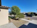 Landscaped yard with desert plants and a paved walkway at 18128 N Bell Pointe Blvd, Surprise, AZ 85374