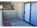 Private patio with gravel and sliding glass door access at 2041 W Bloomfield Rd # 1, Phoenix, AZ 85029