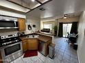 Well-equipped kitchen with stainless steel appliances at 9209 N 59Th Ave # 105, Glendale, AZ 85302